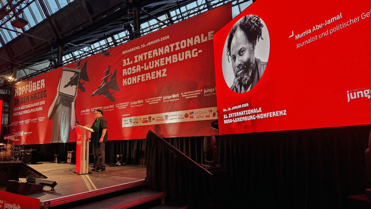 20260110 130049 - Viva Venezuela, Kuba und Palästina! - 31. Internationale Rosa-Luxemburg-Konferenz, Andrea Hornung, Berlin, DKP, junge Welt, Kutlu Yurtseven, Luxemburg-Liebknecht-Demonstration 2026, Mark Ellmann, Martín Saatdjian, Microphone Mafia, Patrik Köbele, SDAJ, UZ-Abo-Kampagne, Yoram Bejarano - Blog, Aktion