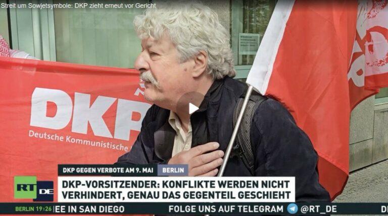 Screenshot RT DE Klage der DKP - Politisches Urteil befürchtet - Marlen Mausch-Liotta - Marlen Mausch-Liotta